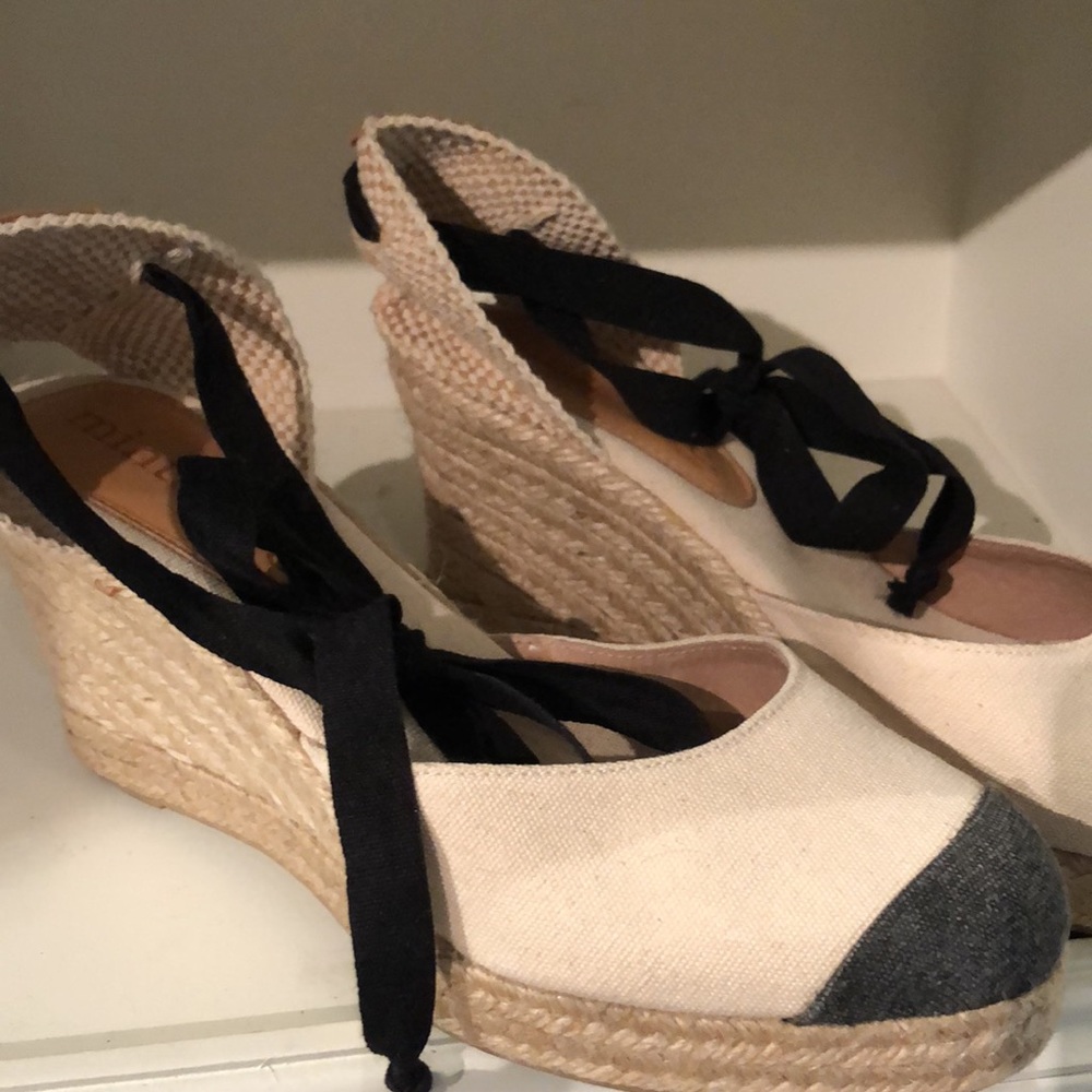 Mint & Rose espadrilles will add sexy to your summer.Cream Canvas wedges. Size 8